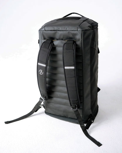 Rear view of the Scuffle Duffle in backpack mode with padded straps and reflective detailing