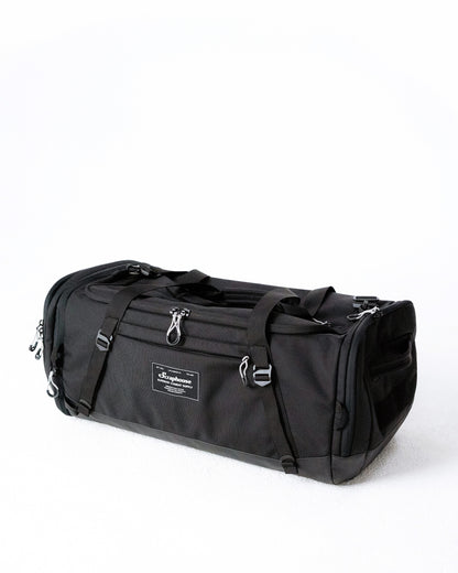 Scuffle Duffle combat sports gym bag in Volcanic Black, angled view showing the semi-rigid structure